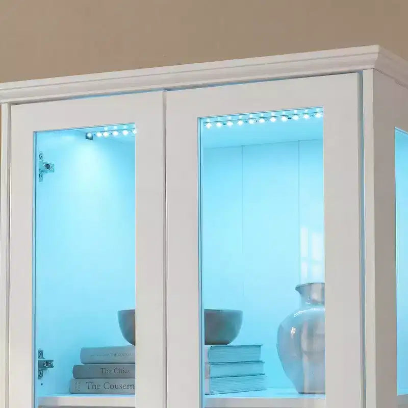 Vetrina-libreria bianca con illuminazione LED RGB, cassetto e ante in vetro